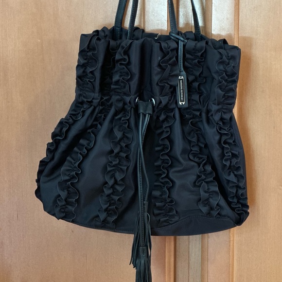 Banana Republic Handbags - LIKE NEW Banana Republic black nylon tote/purse with ruffles water resistant